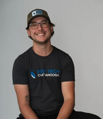 Michael, in a Pest Tech cap and T-shirt