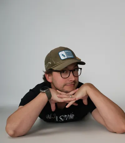Michael, resting chin on hands