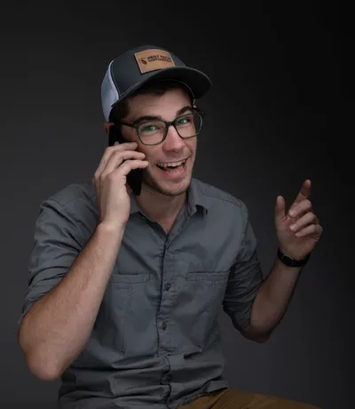 Dan, on the phone and pointing